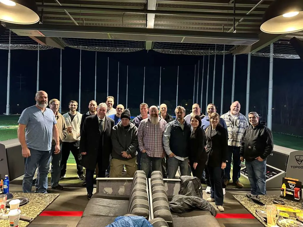 The Smart Tek of Long Island team together at a Topgolf team night