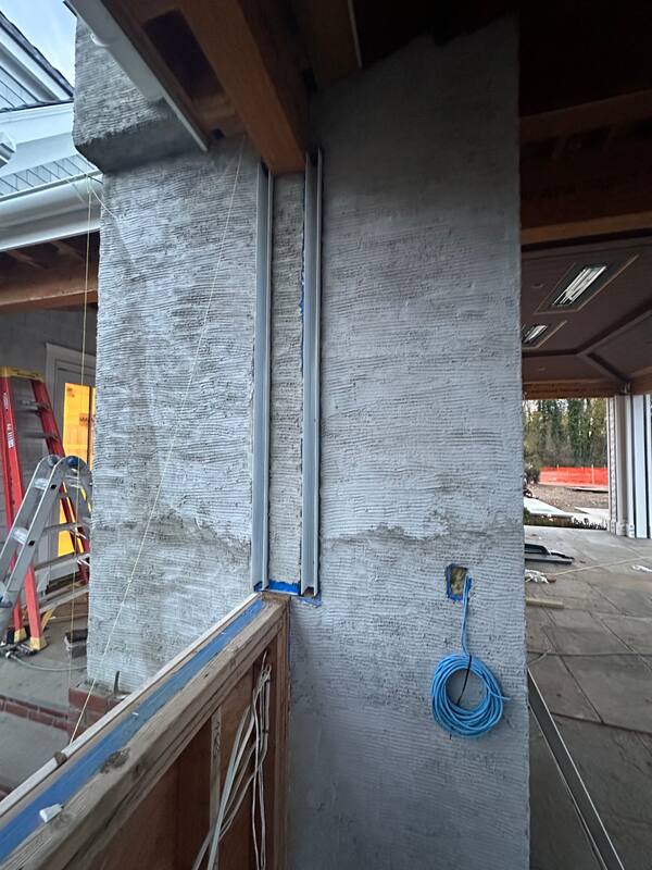 Recessed shade tracks in stucco columns
