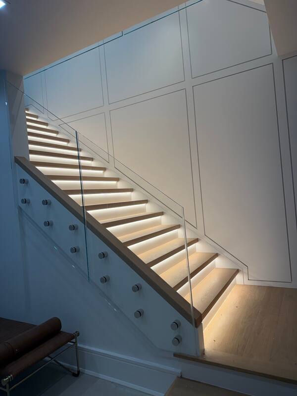 Foyer stair with glass balustrade