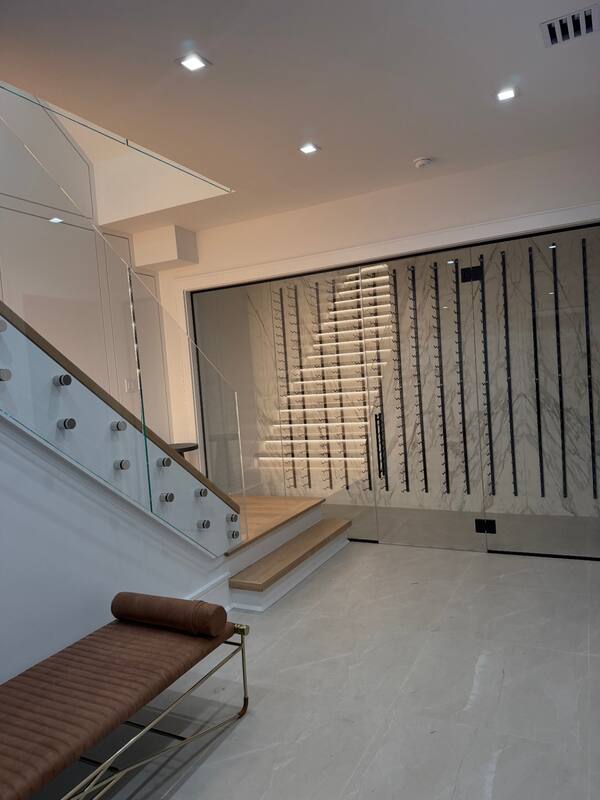 Foyer with glass wine display