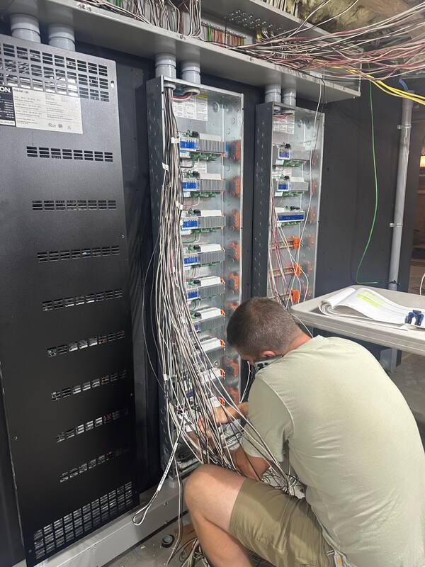 Technician terminating and labeling wiring