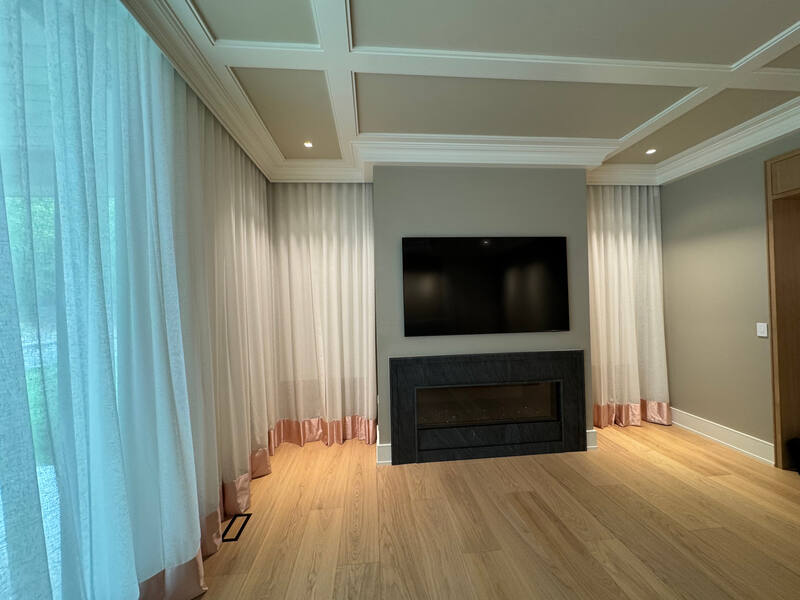 Close view of fireplace wall and TV